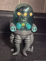 Front view showing clear canopy, Romeo figure and octopus legs