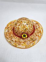 Top view showing overall hat shape and flower accent