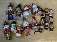 Overview of all 12 glass ornaments laid out