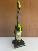 Front view of Bissell upright vacuum showing full unit