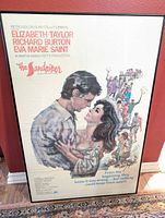 Full view of framed The Sandpiper poster showing artwork, text and frame