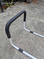 Oblique view showing U-shaped base and foam grip