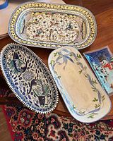 All four serving pieces displayed on table