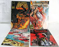 All four comic books laid out: Savage Dragon #17, Supreme #2, Avengers West Coast #79, Dracula #1