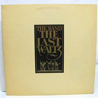 Front of beige album slipcase with title graphic