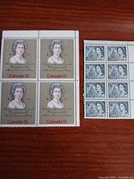 Overview showing both stamp blocks: 15¢ block of 4 and 8¢ block of 8