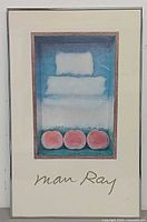 Full view of framed Man Ray "Pechage" poster