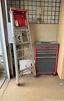 ladder beside rolling tool chest