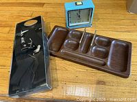All items together: clock, dress accessories in packaging, wooden valet tray