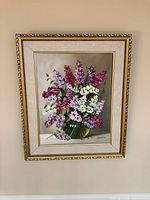 Full view of framed floral painting