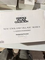 Box top showing Heritage Village Collection labeling