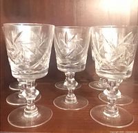 set of eight cut-crystal stemmed glasses