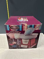 Front of boxed cotton candy machine