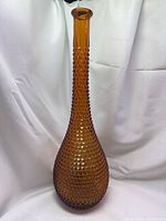 Full view of amber hobnail diamond glass bud vase