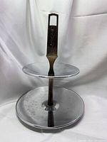 Front view showing both chrome tiers and wood handle
