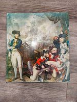 Front cover showing illustrated naval battle scene