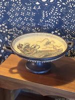 Overall view of footed kylix bowl with handles