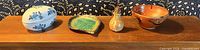 Group shot of all four ceramic items on shelf