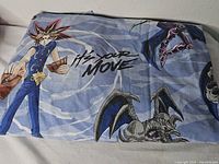 Folded sheet showing main character graphic and slogan