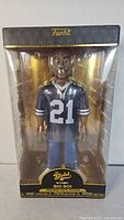 Front of sealed Funko Gold Outkast Big Boi figure in window box