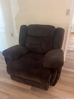 Front view of dark brown fabric recliner chair