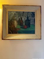 Frontal view of framed still life painting
