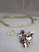 Necklace, circular brooch, bead cluster pin overview