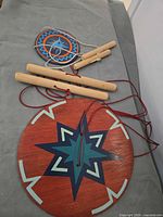 entire set showing two discs, three dowel handles and cords