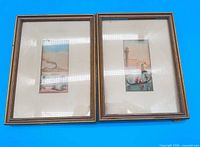 Both framed prints side by side showing frames and mats