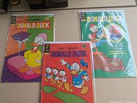 Front covers of all three bagged comics