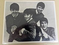 Front view of the black and white Beatles promotional photo in sleeve