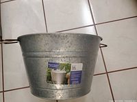 Full view of galvanized steel tub with side handles