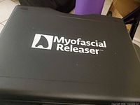 Exterior of black Myofascial Releaser carrying case