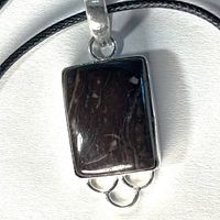 Front view of Picasso jasper pendant on cord