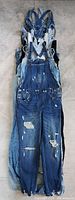 Stack of nine overalls hung together showing full length front view