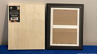 Front view of artist panel beside picture frame showing size and finish