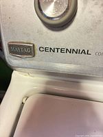 Maytag Centennial badge on control panel