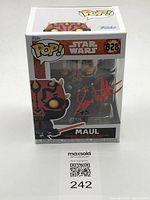 Front of boxed Funko Pop showing autograph and figure