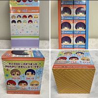 Four angles of the sealed outer carton showing front, back, top and side graphics