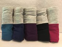 Five rolled briefs showing waistband and body colors