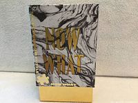 Front view of sealed box showing puzzle title and design