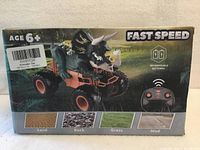 Front of box showing Bennol Dinosaur RC Car, images of vehicle, controller and key features