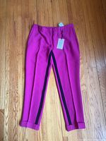 Full view of Veronica Beard fuchsia trousers with black stripe, cuffed hem