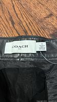 Coach label showing brand and size 8