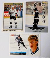 All three Wayne Gretzky cards laid out