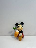 Front view of Mickey Mouse resin figurine showing colors and overall design