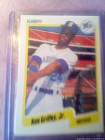 Front view of the Ken Griffey Jr. 1990 Fleer card in plastic top-loader