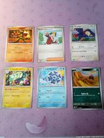 All six cards laid out for overview