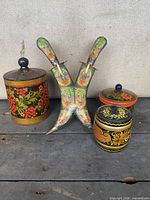 Front view showing all three canisters and double dagger set