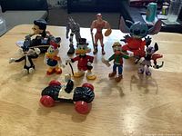 Full group of all ten figurines on table